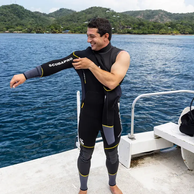 Diver wearing Sport Steamer 5mm on boat deck